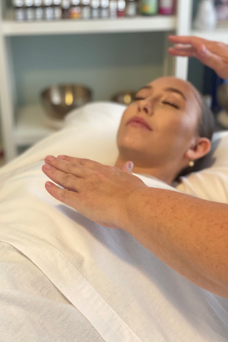 Reiki being performed on a client.