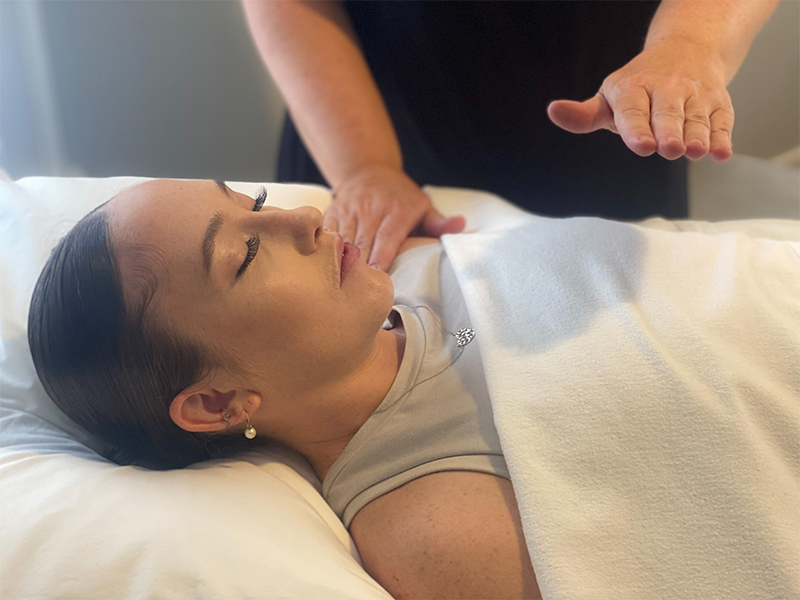 Reiki being performed on a client